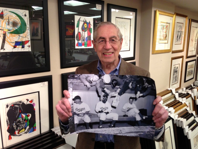 Eddie Dweck holds a copy "the photograph" at Studio 57 Fine Arts Gallery, March 2013